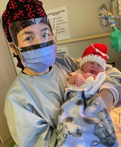 Midwife Yuefang catching the first Xmas Baby!